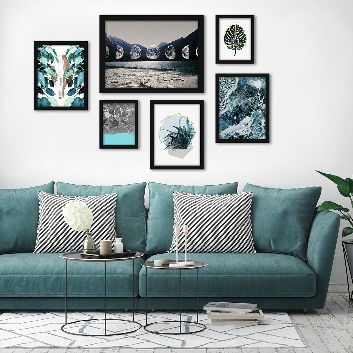Gallery wall with nature-themed framed artwork displayed. 