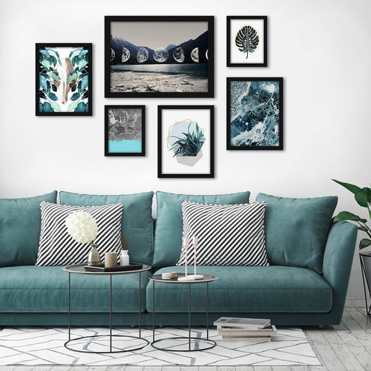 Gallery wall with nature-themed framed artwork displayed. 