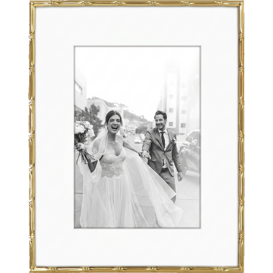 Gold bamboo-style Memento frame with a wide white mat, holding a black-and-white wedding photo #flat