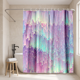 Abstract shower curtain of a pixelated lilac and mint gradient in a walk-in shower beside a black rain head and stool 