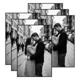 Six black 4x6 frames stacked, a couple embracing on a busy street 