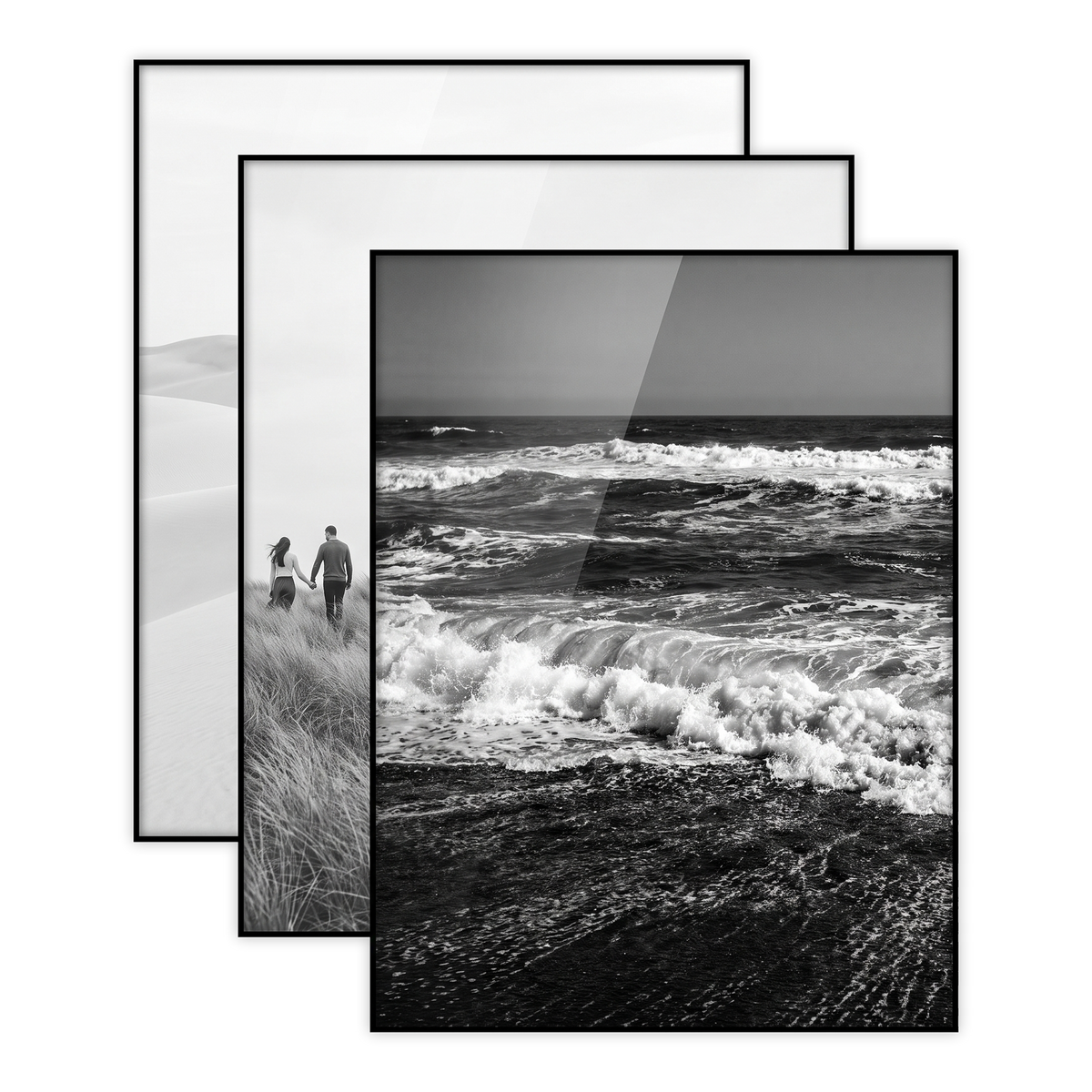 Three black 11x14 frames stacked, a wave crashing onto a shore 