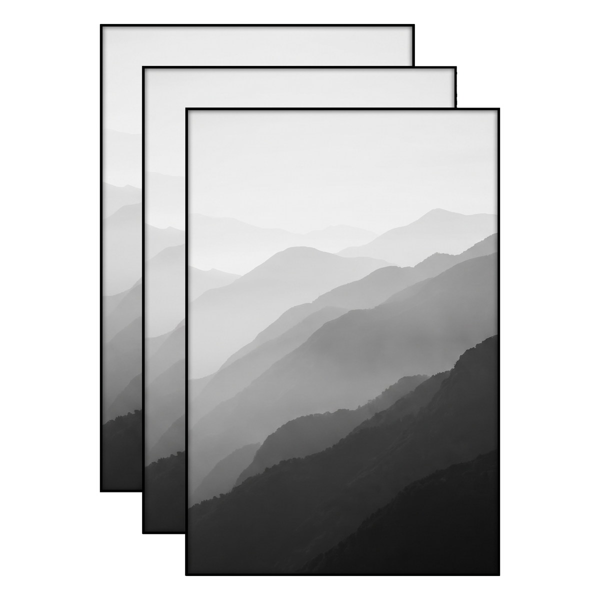 Three black 12x18 frames stacked, layered mountain ridges fading into mist 