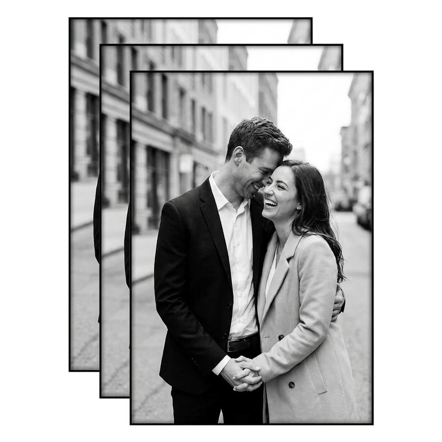 Three black 13x19 frames stacked, a couple holding hands on a city street 