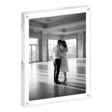 Clear acrylic 8.5x11 block frame with magnet corners, a couple dancing in a sunlit hall 