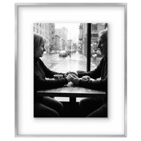 Polished nickel 16x20 float frame, a black-and-white photo of an older couple at a cafe window #flat