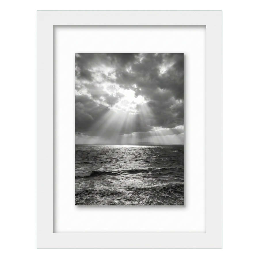 White 8x10 float frame, sunbeams breaking over the sea, floating on white backing 