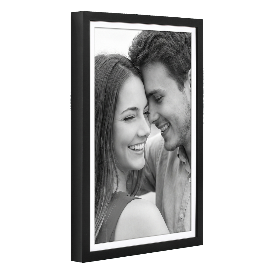 Black 12x18 Soho frame, white mat opening to 11x17, a close-up of a laughing couple 