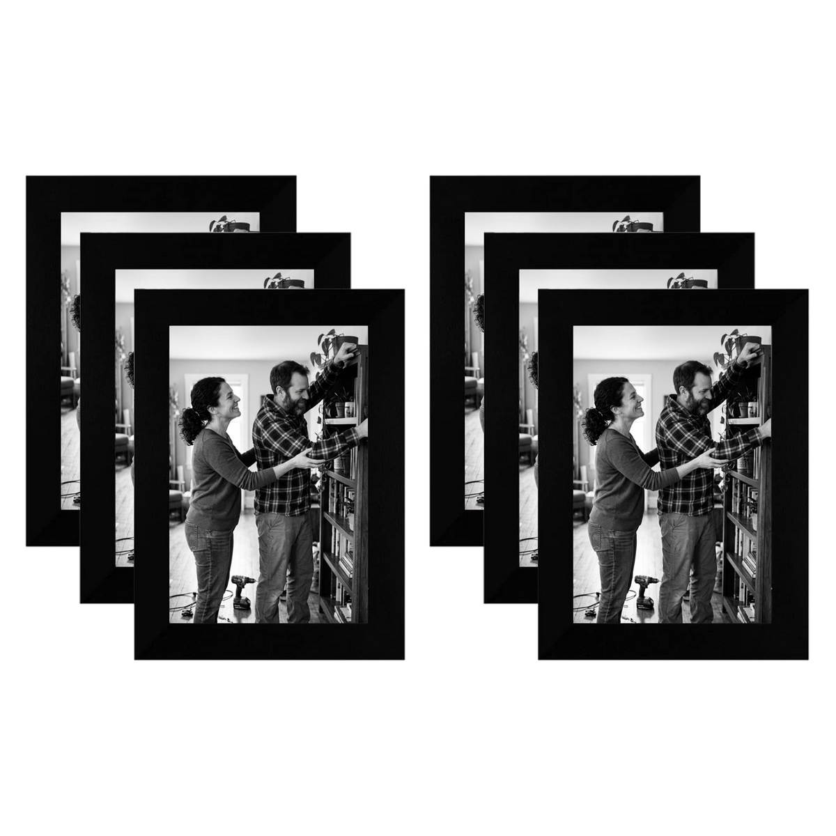 Six black 4x6 frames fanned in two stacks, a couple beside a bicycle on a porch 
