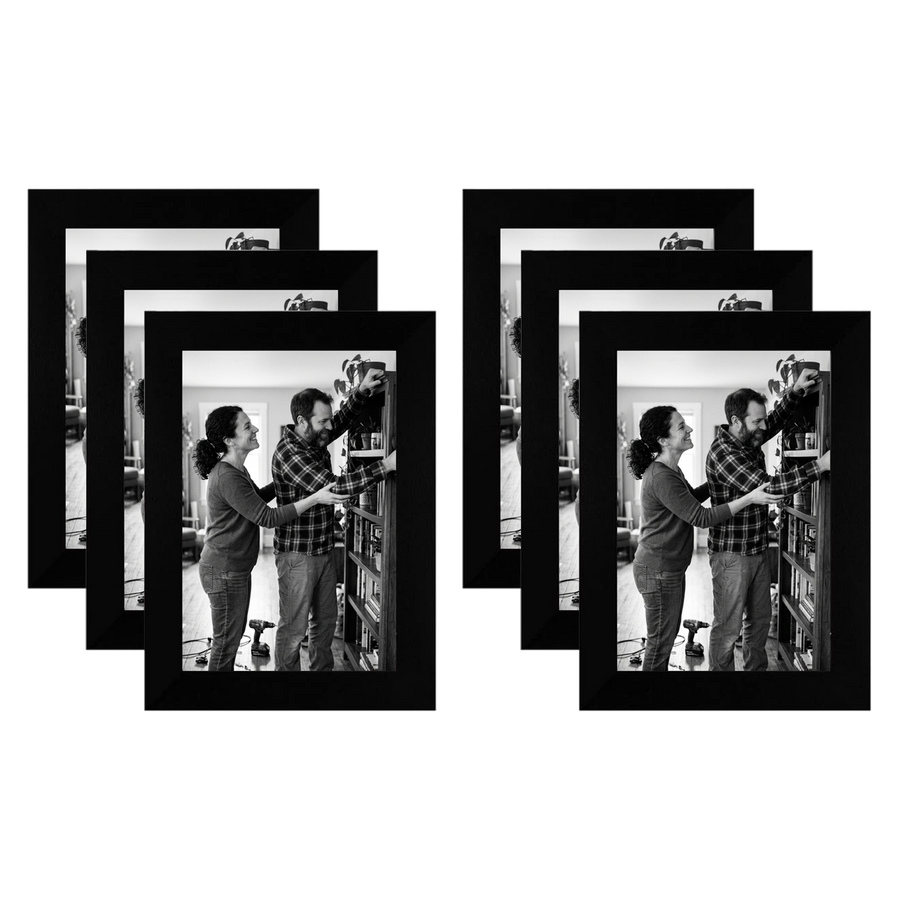 Six black 4x6 frames fanned in two stacks, a couple beside a bicycle on a porch 