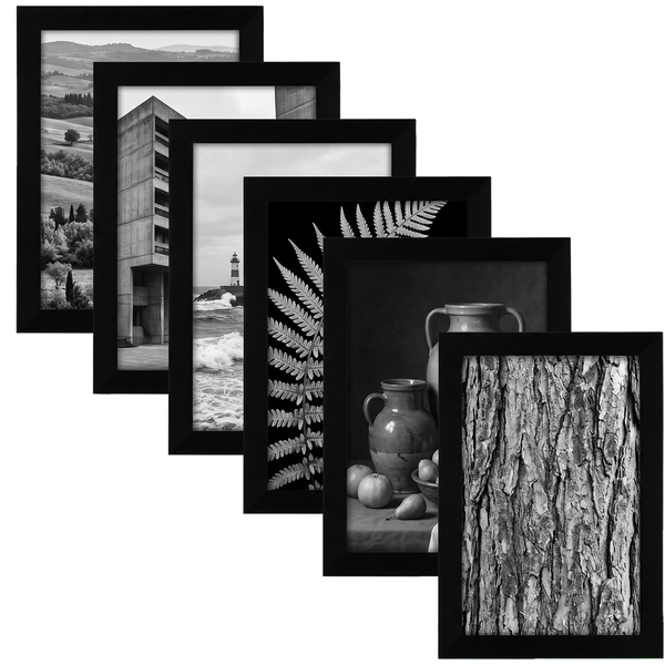 Six 4x6 black picture frames in a fan, unmatted with full-bleed black and white art