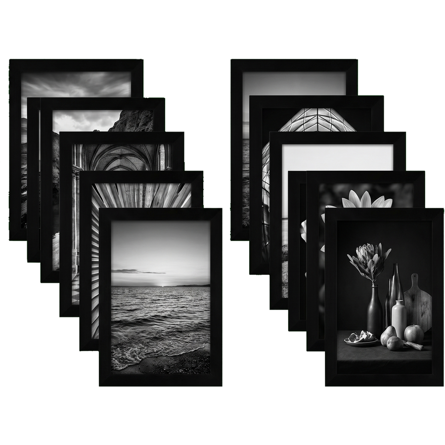 Twelve 8x12 black picture frames in two fans, unmatted with full-bleed black and white art