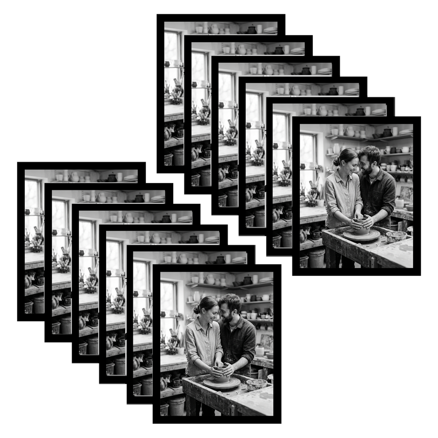 Twelve black 11x14 frames fanned, two people working at a pottery bench #flat