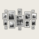 Grand Gallery Wall layout, about 124 by 77 inches — all fifteen black Hudson frames with white mats, the 28x40 at the center 
