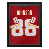 Black jersey case holding a red jersey lettered Johnson 86 