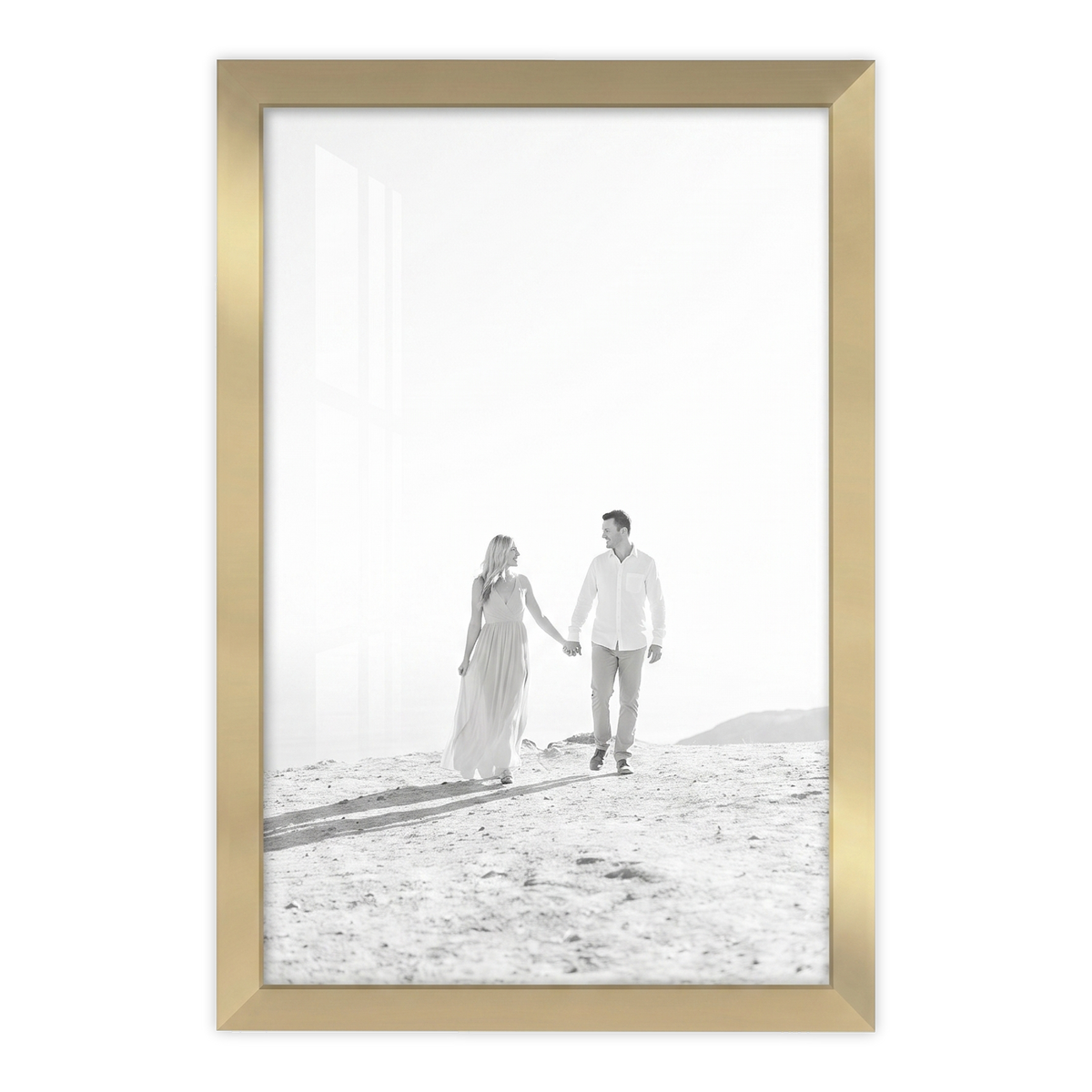 Gold Streamline frame, 4x6,  no mat, holding a black-and-white photo of a couple on a bright beach 