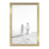 Gold Streamline frame, 4x6,  no mat, holding a black-and-white photo of a couple on a bright beach 