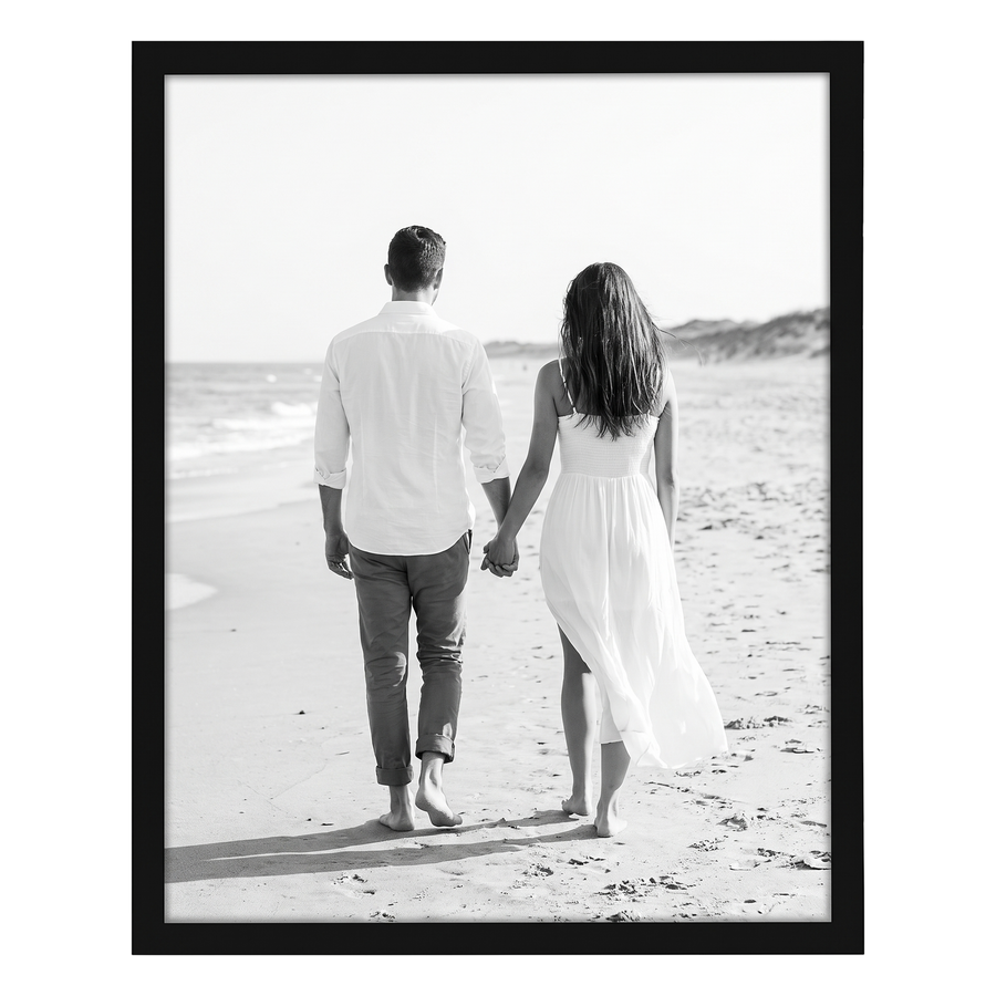 Black Streamline frame, 8x10,  no mat, holding a photo of a couple in white walking away 