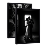 Pair of black Streamline frames, no mat, holding a photo of a couple dancing by a window 