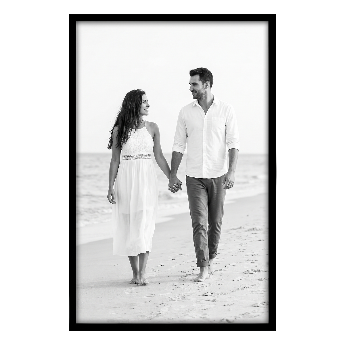 Black Streamline frame, 14x22,  no mat, holding a photo of a couple in white walking toward us 
