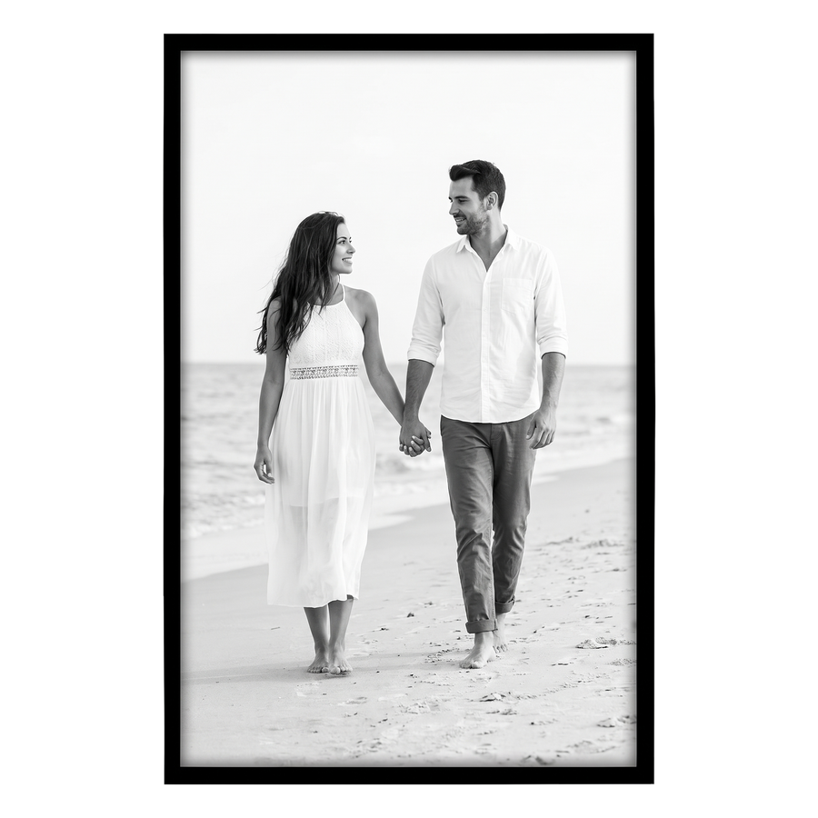 Black Streamline frame, 14x22,  no mat, holding a photo of a couple in white walking toward us 
