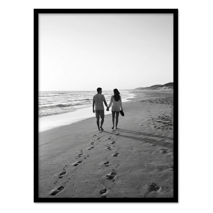 Black Streamline frame, 19x25,  no mat, holding a photo of a couple walking away past footprints 
