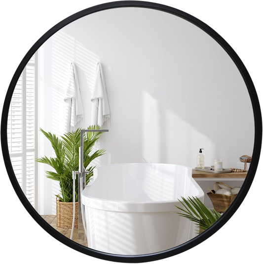 Round black 32x32 framed mirror reflecting a bathroom with a freestanding tub #flat