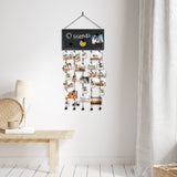 Chalkboard photo display on a wall above a bench with a lamp and basket 