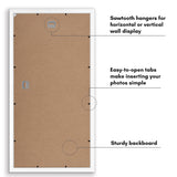 Back of the white newspaper frame: sawtooth hangers, easy-open tabs, sturdy backboard 