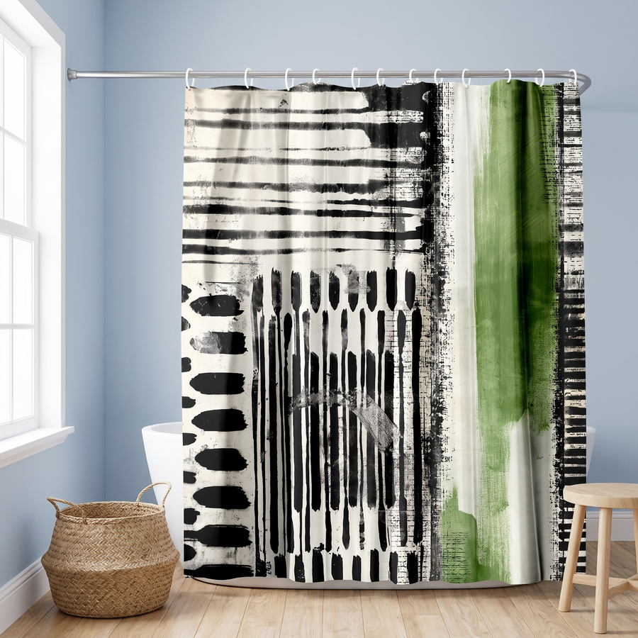 A shower curtain with an abstract black, white, and green brushstroke pattern hanging in a bathroom with light blue walls, a window, a woven basket, and a wooden stool. 