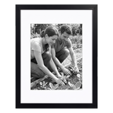 Black 11x14 Soho frame, white mat opening to 8x10, a couple planting seedlings 