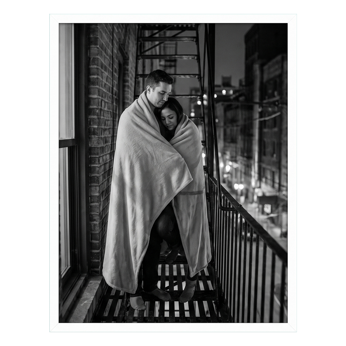 White 18x24 Soho frame with a wide white mat, a couple wrapped in a blanket 
