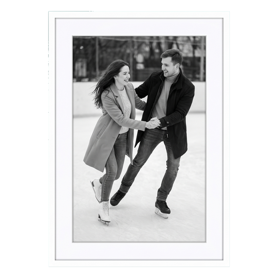 White 20x28 Soho frame, white mat opening to 16x24, a couple ice skating 