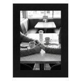Black Signature frame, 4x6, no mat, holding a photo of hands held across a diner table 