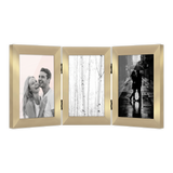 Hinged polished brass 4x6 frame with three panels, a couple, birch trees and a rainy street 