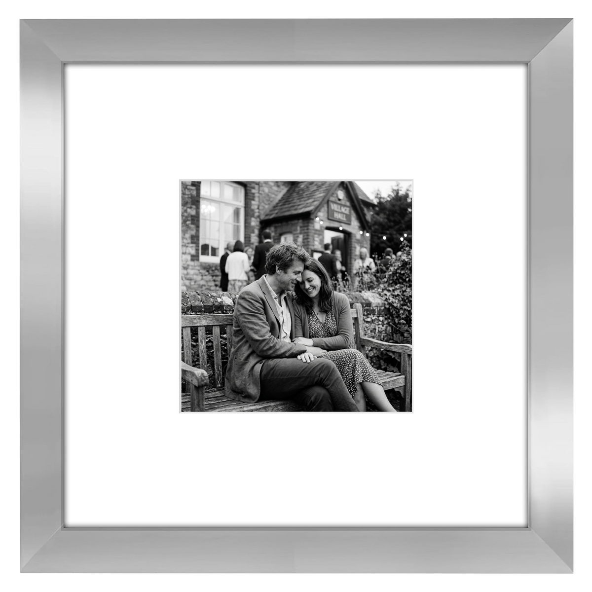 Silver Signature frame, 8x8, with a wide white mat, holding a photo of a couple on a bench 