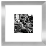 Silver Signature frame, 8x8, with a wide white mat, holding a photo of a couple on a bench 