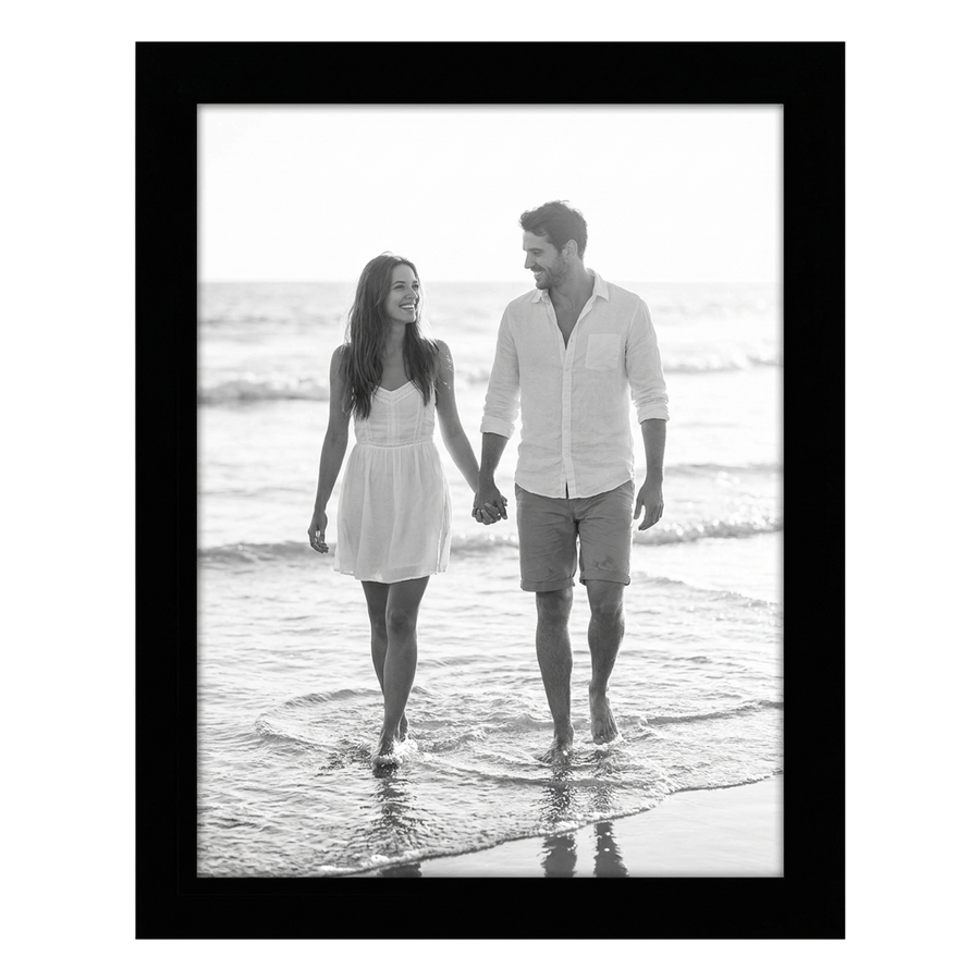 Black Signature frame, 8x10, no mat, holding a photo of a couple walking in shallow water 