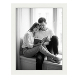 Cream Signature frame, 11x14, no mat, holding a photo of a couple reading by a bright window 