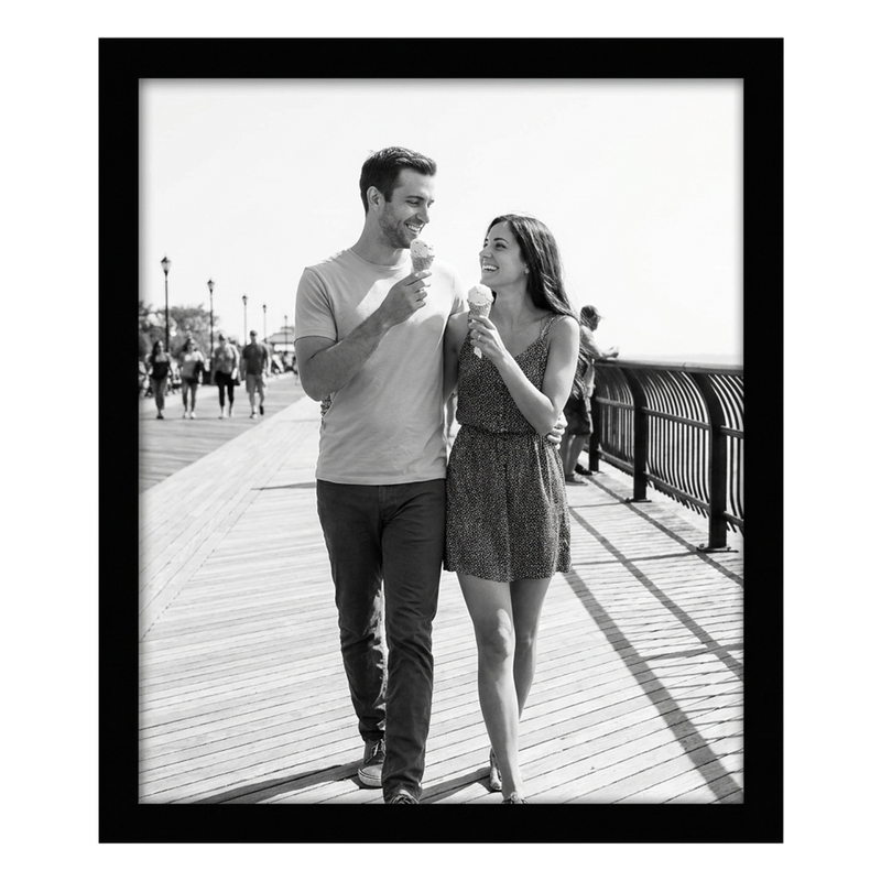 Black Signature frame, 12x14, no mat, holding a photo of a couple with ice cream on a boardwalk #flat