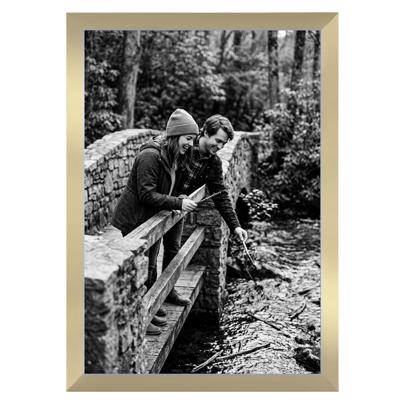 Oak Signature frame, 13x19, no mat, holding a photo of a couple with a dog on a picnic rug #flat