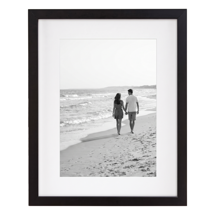 Black Signature frame, 11x14, with a wide white mat, holding a photo of a couple walking away #flat