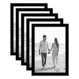 Five stacked black 4x6 Galleria frames, the front one holding a couple holding hands on a beach 