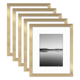 Five stacked gold Galleria frames with white mats, holding a photo of a calm lake at dusk 