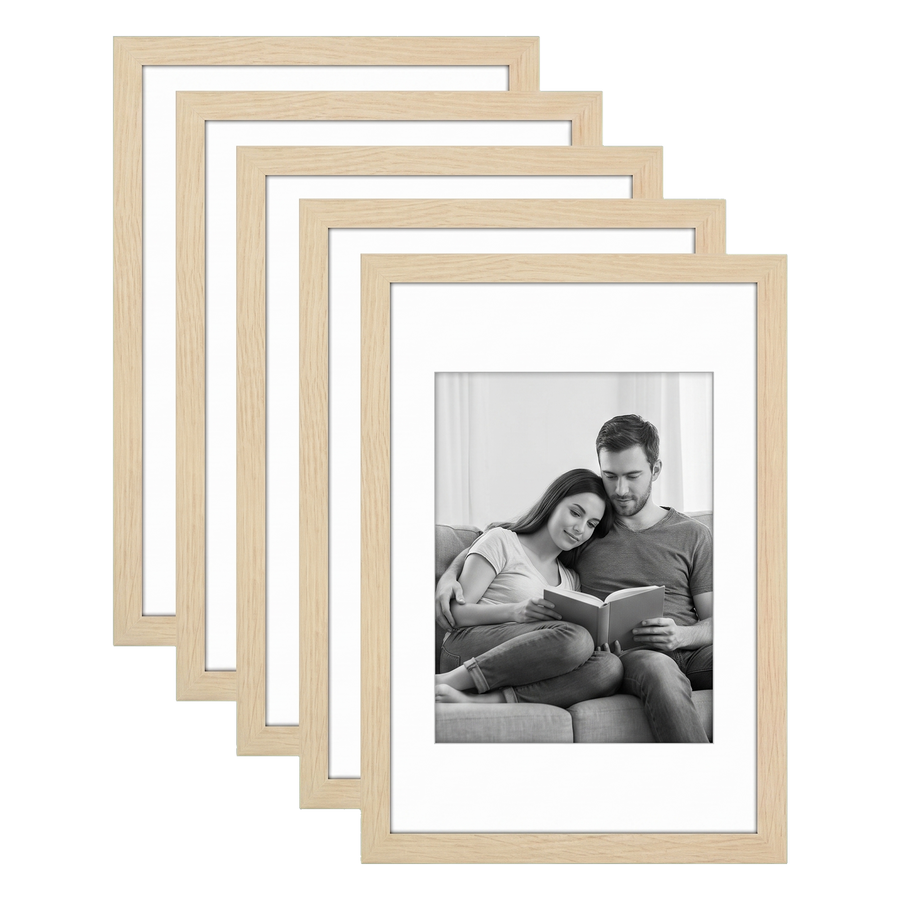 Five stacked natural oak Galleria frames with white mats, holding a photo of a couple reading 