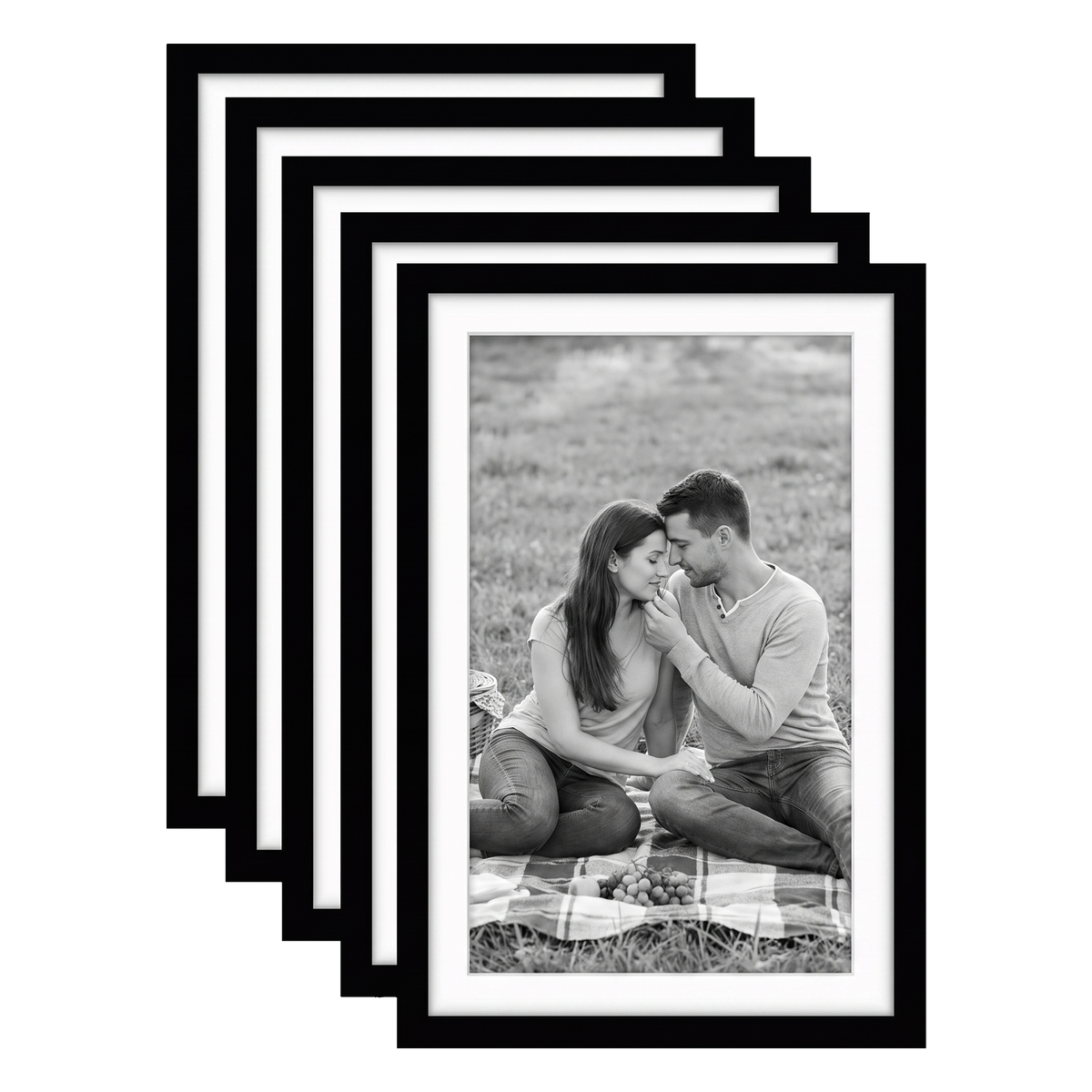 Five stacked black Galleria frames with white mats, holding a photo of a couple on a picnic rug 