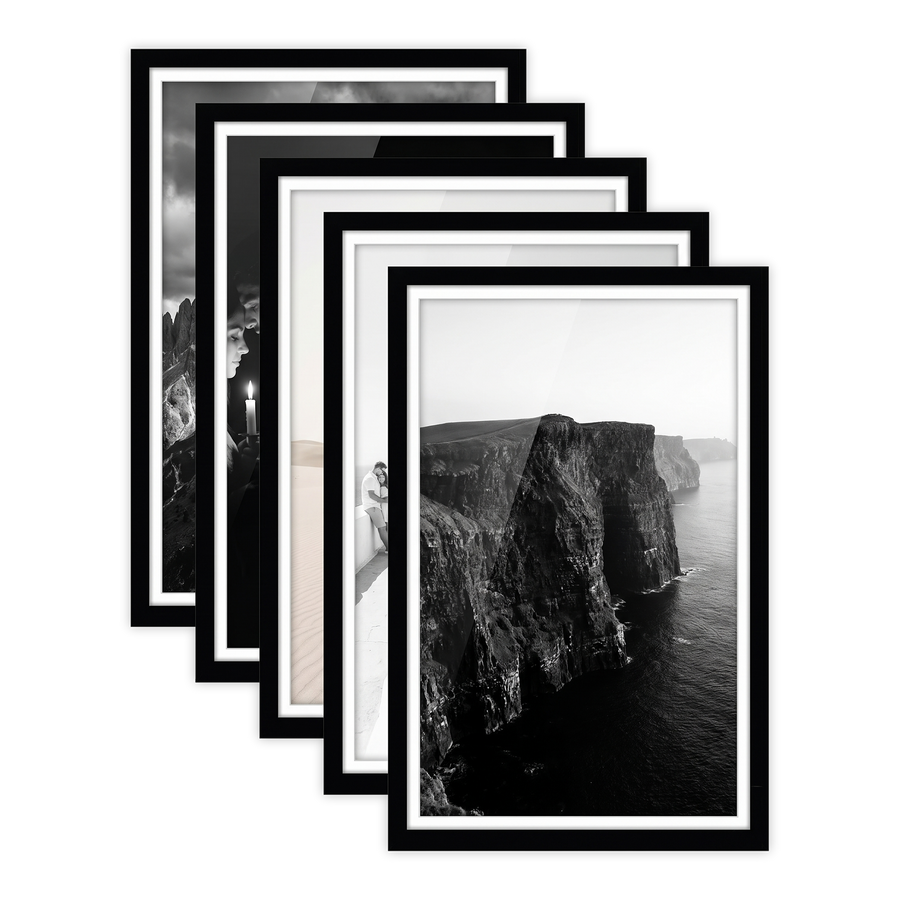 Five stacked black Galleria frames with white mats, holding a photo of steep sea cliffs 