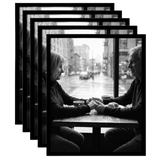 Five stacked black 16x20 Galleria frames, the front one holding a couple holding hands at a cafe window 