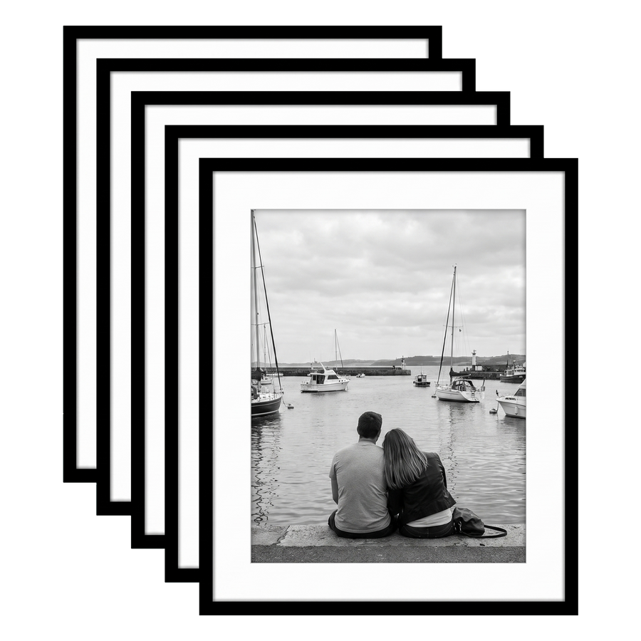 Five stacked black Galleria frames, 18x22, with 14x18 white mats, holding a photo of a couple at a harbour 