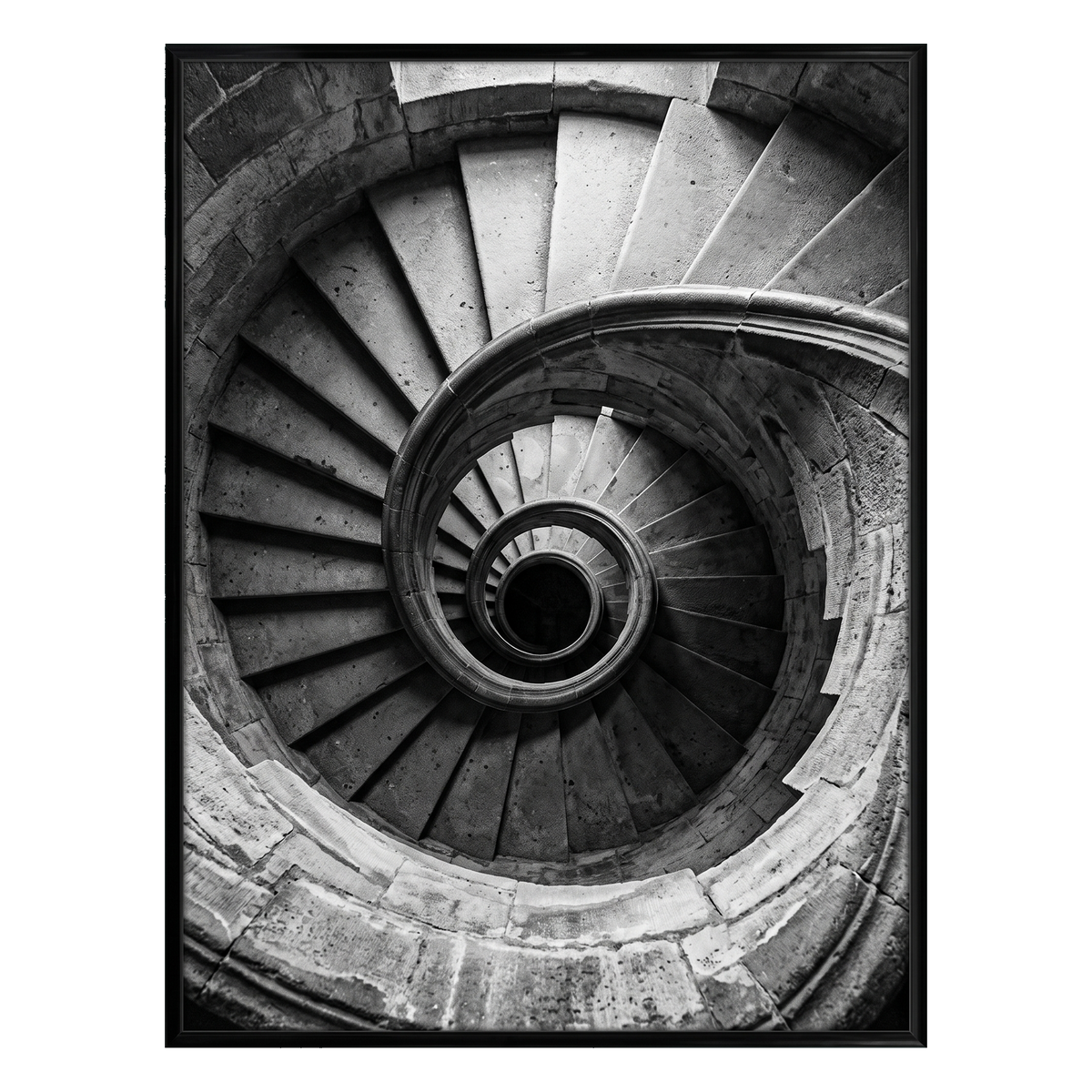 Black 18x24 Fusion frame holding a black-and-white photo of a stone spiral staircase from above 